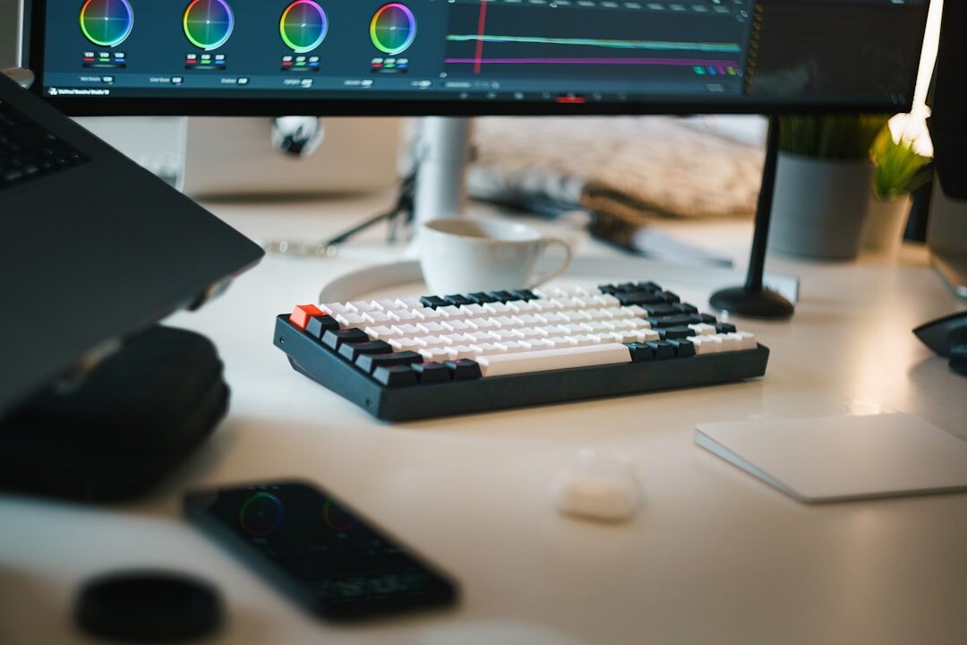 Modern media office with computer screens and staff