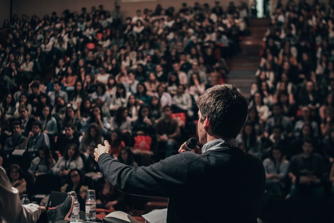 Business executive speaking at a conference panel